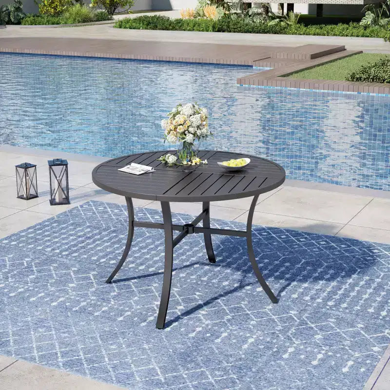 Captiva Designs 7pc Black Round Slatted Steel Table with Umbrella Hole & Textilene Chairs