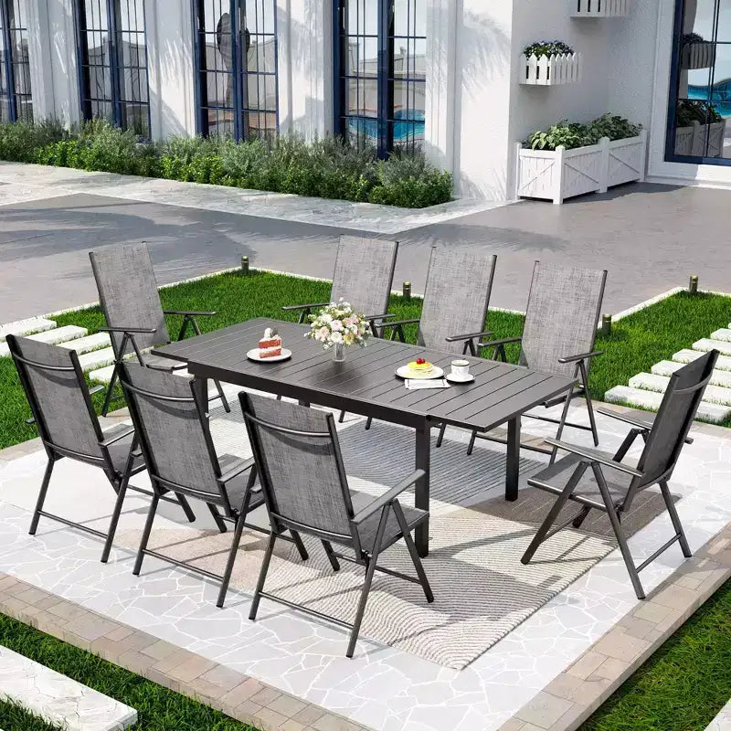 Ensemble de salle à manger d'extérieur Captiva Designs 9 pièces avec table rectangulaire en acier réglable à lattes et chaises pliantes en textilène