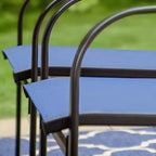 Ensemble repas d'extérieur 7 pièces Captiva Designs avec table rectangulaire à lattes et chaises de salle à manger fixes en textilène
