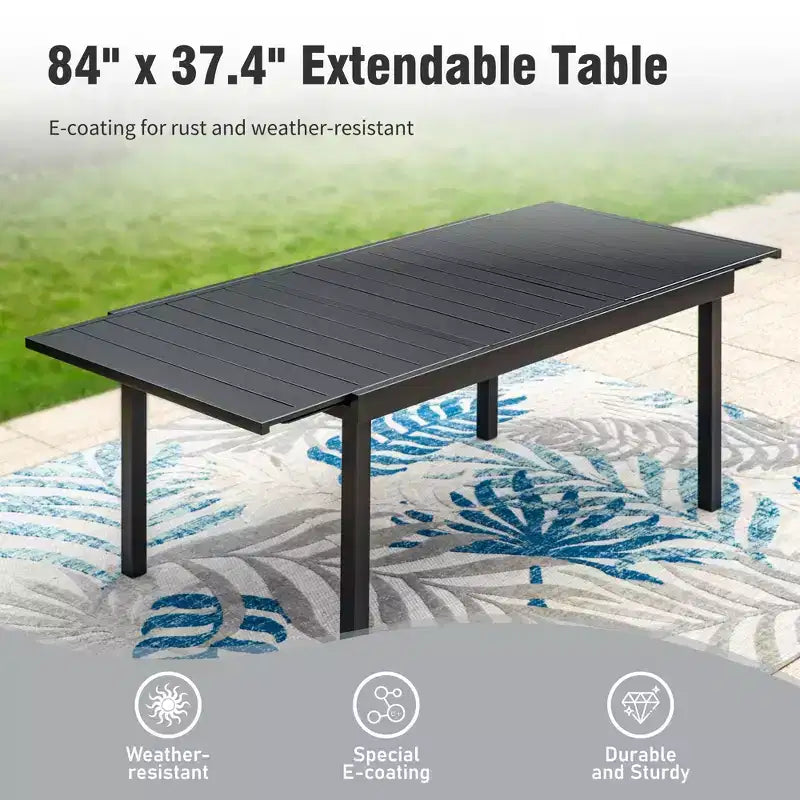 Captiva Designs Ensemble repas de 9 pièces pour terrasse avec table extensible rectangulaire en acier, chaises fixes en rotin et métal et fauteuils pivotants.