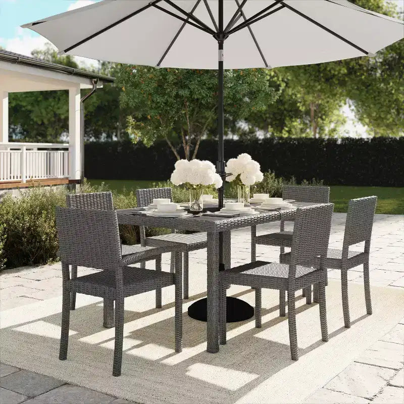 Martha Stewart Bedford 7-Piece Indoor-Outdoor Dining Set with 6 Stackable Dining Chairs and 62 Patio Table with Engineered Wood Top in Rattan Wicker