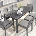 Ensemble de salle à manger d'extérieur Martha Stewart Bedford avec table de 180 cm et 8 chaises avec finition en aluminium brossé aspect bois et coussins résistants aux intempéries