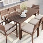Ensemble de salle à manger d'extérieur Martha Stewart Bedford avec table de 180 cm et 8 chaises avec finition en aluminium brossé aspect bois et coussins résistants aux intempéries