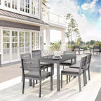 Ensemble de patio intérieur/extérieur Martha Stewart Bedford avec table de 62 po et 6 chaises de salle à manger avec finition en aluminium brossé imitation bois et coussins toutes saisons
