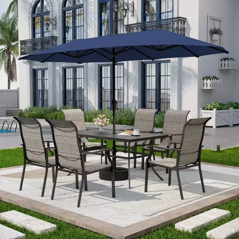 Captiva Designs - Ensemble de 8 pièces pour salle à manger d'extérieur, comprenant une table rectangulaire en acier, des chaises rembourrées avec assise en toile tendue et un parasol de marché.