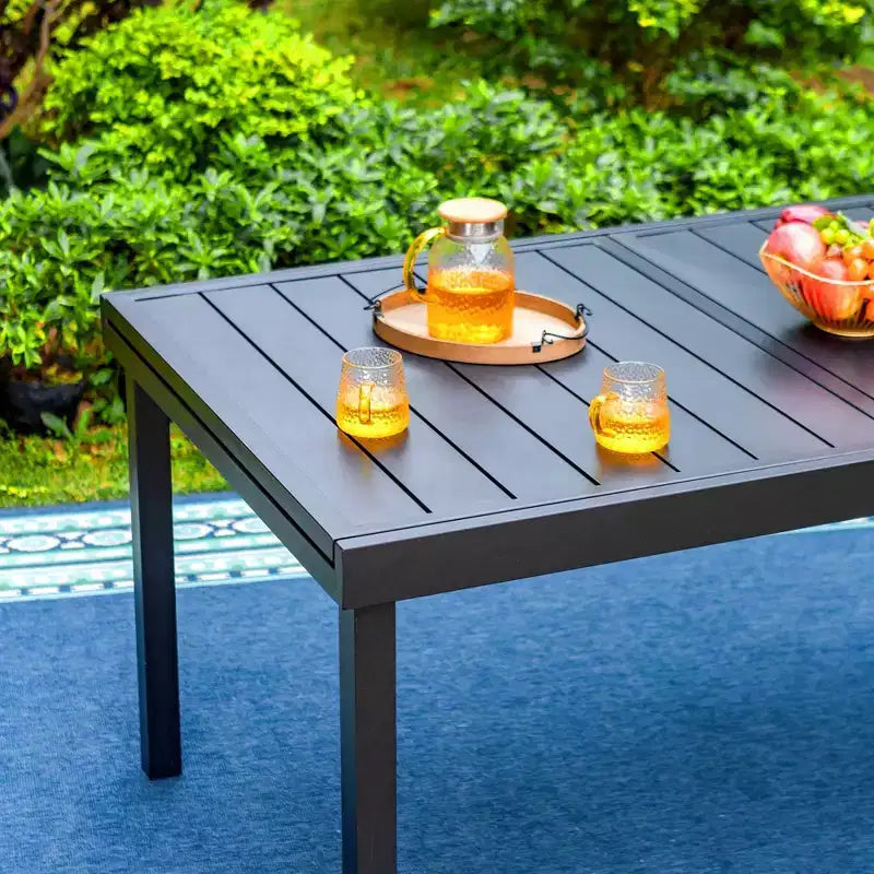 Captiva Designs - Table à manger extensible en acier 7 pièces et chaises pivotantes en osier avec coussins épais pour patio