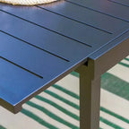 Captiva Designs - Table à manger extensible en acier 7 pièces et chaises pivotantes en osier avec coussins épais pour patio