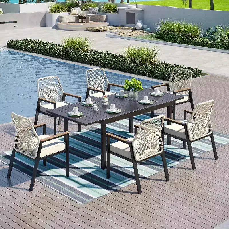 Captiva Designs - Table à manger extensible en acier 7 pièces et chaises pivotantes en osier avec coussins épais pour patio