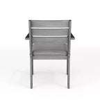 Ensemble de patio Martha Stewart Bedford 5 pièces en aluminium, 4 fauteuils de salle à manger empilables avec coussins, table ronde à piètement tréteau de 36 po, fini grain de bois brossé