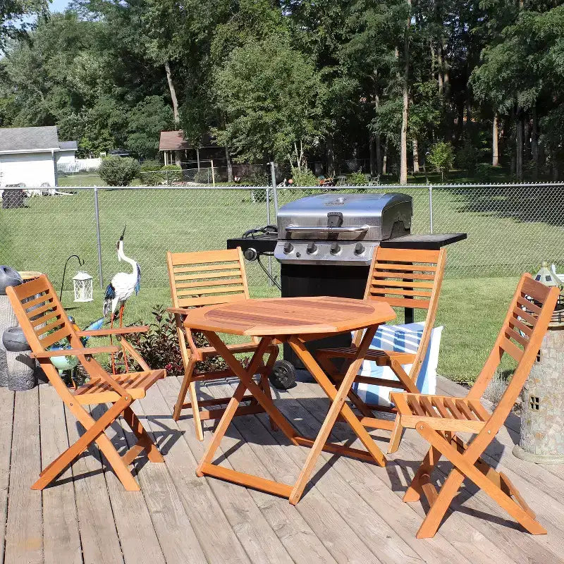 Sunnydaze Outdoor Meranti Wood with Teak Oil Finish Folding Patio Dining Table and Chairs - Brown - 5pc