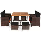 Costway Ensemble de salle à manger d'extérieur 9 pièces en rotin, chaises rembourrées, pouf, plateau de table en bois blanc/rouge/noir