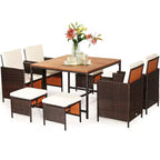 Costway Ensemble de salle à manger d'extérieur 9 pièces en rotin, chaises rembourrées, pouf, plateau de table en bois blanc/rouge/noir