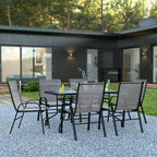Ensemble de table de patio sept pièces Emma et Oliver avec table en métal avec plateau en verre trempé et 6 chaises empilables Flex Comfort