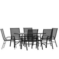 Ensemble de table de patio sept pièces Emma et Oliver avec table en métal avec plateau en verre trempé et 6 chaises empilables Flex Comfort