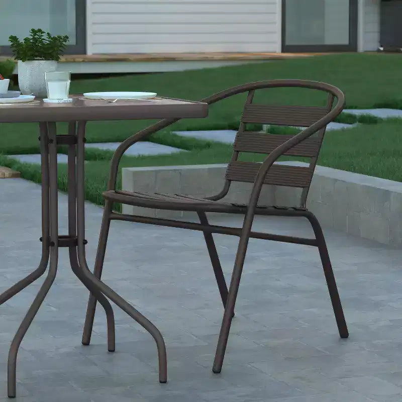 Emma and Oliver 23.5'' Square Glass Top Metal Table with 2 Aluminum Slat Stack Chairs