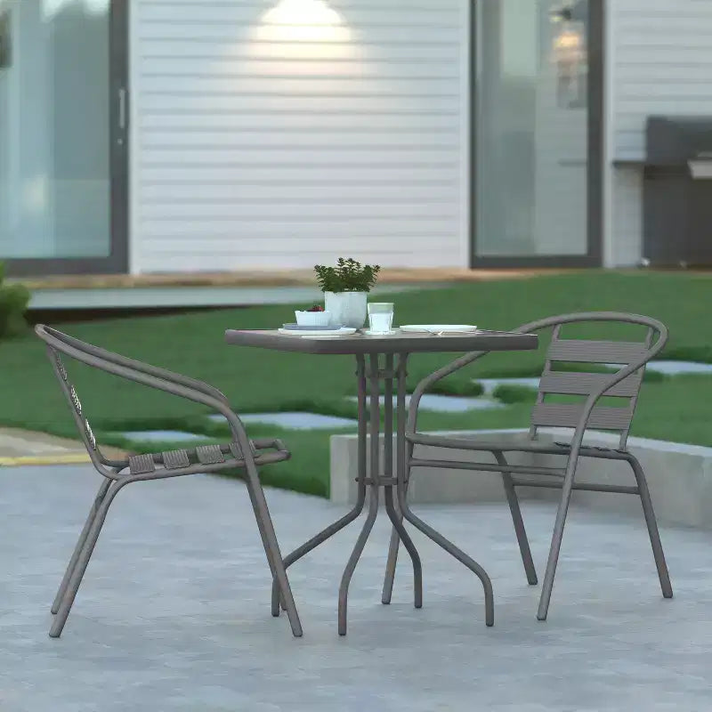 Emma and Oliver 23.5'' Square Glass Top Metal Table with 2 Aluminum Slat Stack Chairs