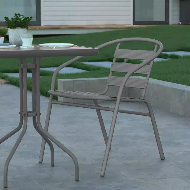 Emma and Oliver 23.5'' Square Glass Top Metal Table with 2 Aluminum Slat Stack Chairs