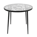 LeisureMod Devon Ensemble de salle à manger d'extérieur 5 pièces - Table ronde en verre avec 4 chaises empilables noires à motif floral